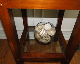 Glass bowl with shells and things