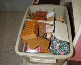 Comes complete with doll house furniture. Which is good, because regular people furniture would not fit
