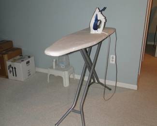Ironing board and iron. The perfect duo