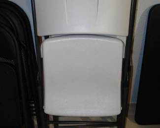 Two large folding chairs