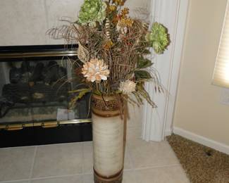 Tall, sexy cylindrical vase with some faux floral picks