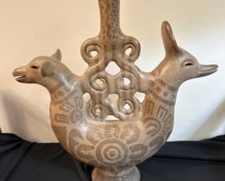 Mexican folk art burnished pottery candelabrum.