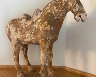 Painted pottery of a horse by Tang Dynasty Chinese tomb figurines.