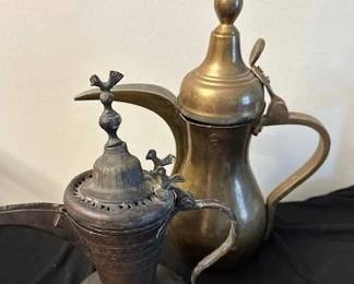 Brass hand hammered copper Middle Eastern coffee pots.