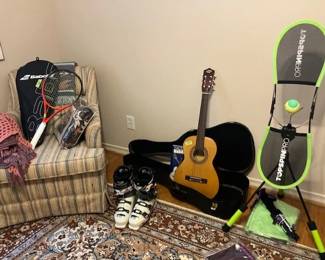Ski boots, guitar and tennis practice machine
