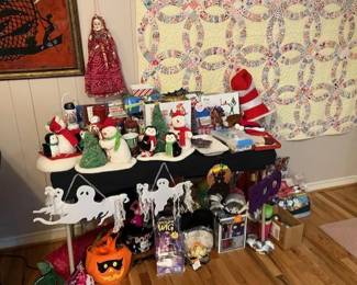 Lots of holiday decorations, Indian puppet, antique quilt