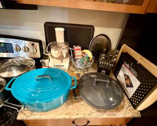 Brand New Martha Stewart cast iron dutch oven and a Dansk cast iron dutch oven.