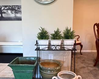 Beautiful large planters ad wrought iron.