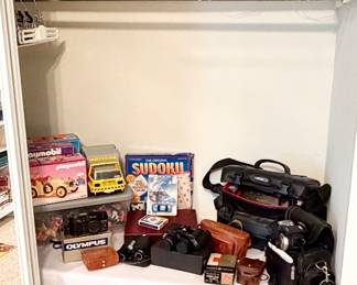 Cameras, frames and vintage toys.