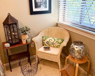 Cute wicker chair and decor.