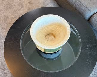 Large round coffee table.
