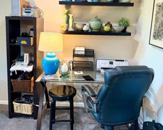 Glass and metal desk and office chair.