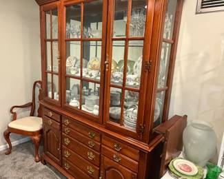Lexington cherry china cabinet with so much storage! Comes apart in two pieces for transporting.