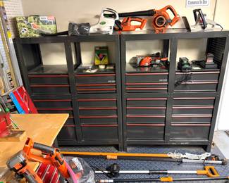 A set of Craftsman rolling tool cabinets, and a selection of cordless leaf blowers.