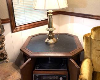 A vintage 1960s Magnavox record player and radio console 