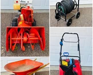 a vintage Ariens two-stage snow blower, an orange wheelbarrow, four-wheeled metal hose trolley and a Toro Power Clear 518 ZE single-stage gas snow blower.