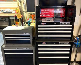 Craftsman 2000 Series tool cabinets and chests and a Craftsman 3-drawer portable tool chest.
