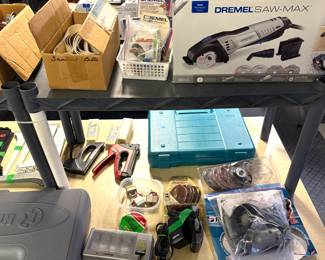 a Dremel Saw-Max cutting tool kit And a Makita 7.5 Amp 4.5-inch Angle Grinder.