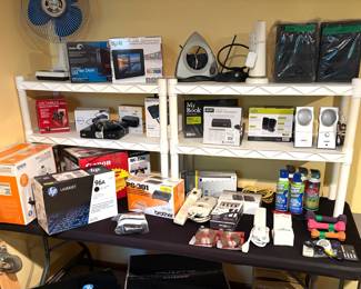 Electronics including a HP 96A Black Toner Cartridge (Model C4096A), a pair of Bose Companion 2 computer speakers, and a vintage RadioShack brand UHF/VHF/FM indoor television antennas.