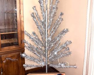 Vintage aluminum tinsel Christmas tree with original box, sleeves, and color wheel