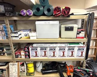 Huge selection of adjustable mobile home jacks, camping equipment and a Coleman PowerChill iceless cooler 