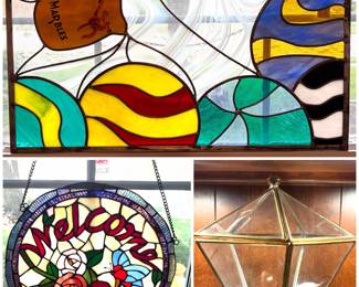 A handmade stained glass panel, stained glass  and a vintage pentagonal brass and glass terrarium display box.