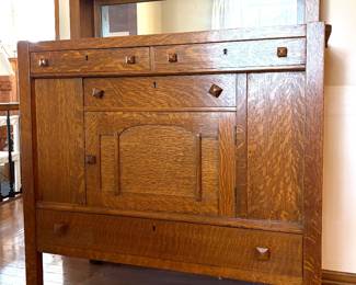 Antique mission oak sideboard buffet featuring a beveled mirror backsplash