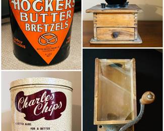 A vintage Charles Chips metal tin, a vintage Hockers Butter Pretzel tin, and two vintage vintage wooden coffee mill grinders.