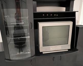 Black Entertainment unit. 58”x21”x 71 1/2” 