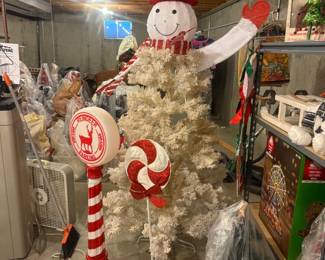 The reindeer candy cane bottom left of the image, has been removed due to damages and electrical cord issues