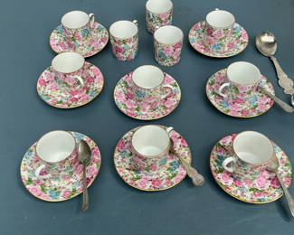 Lot 81: Floral teacups and saucers with vintage spoons