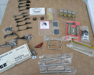 Lot 38: Assorted door and cabinet hardware kit with locks, hinges, and pulls