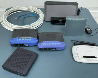 Lot 96: Sony Dream Machine, Brook Stone White noise Machine, And A Few Routers