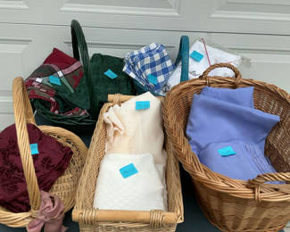 Lot 89: 10 Large Table Cloths, 5 Baskets