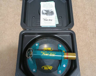 Lot 43: Wood's Powr-Grip Vacuum Lifting Tool with Case and Manual
