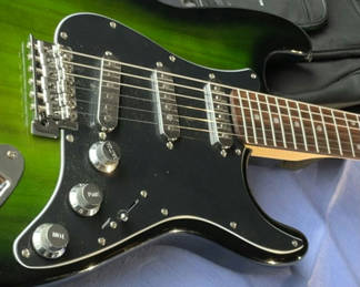 Lot 71: Green Sunburst Strat-Style Electric Guitar with Chromacast Gig Bag