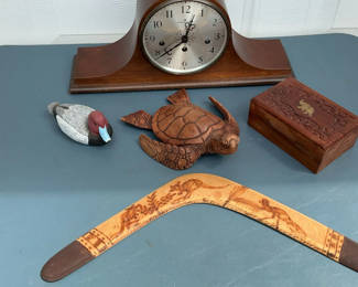 Lot 83: Antique mantel clock with carved turtle figurine, jewelry box, and curved decorative panel