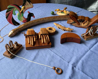 Lot 19: Collection of wooden mechanical toys and puzzles