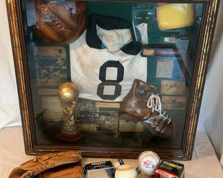 Lot 97: Sports memorabilia collection: baseball gear and soccer display