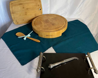 Lot 95: Wooden cutting boards, spoon, and ornate serving tray with cheese knife