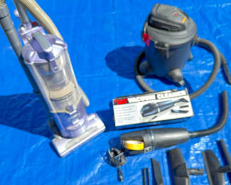 Lot 33: Shop-Vac, Hand vac and a Shark Upright vacuum, with hoses and attachments