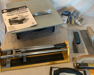 Lot 47: Master Cut 7-inch Portable Tile Saw with Manual and Accessories