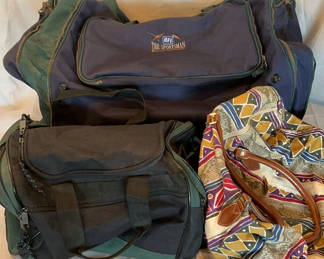 Lot 78: Three travel bags: blue sports duffel, black/green duffel, and patterned weekend bag