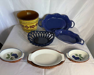 Lot 25: Blue ceramic bakeware set with yellow floral planter and cherry-pattern dishware
