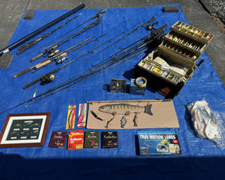 Lot 35: Collection of fishing rods, reels, and tackle