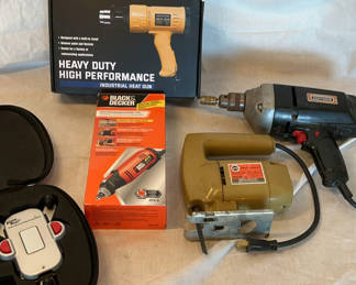 Lot 115: Assorted power tools including heat gun, drill, jig saw, rotary tool and laser level