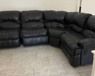 Used leather couch both ends are manual recliners