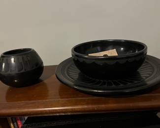Left Pueblo pottery, Right, Marie Santana pottery