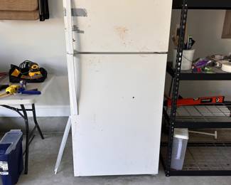 L99 - $75. Whirlpool Garage Fridge / Freezer. 2015. Works great - But looks like a garage fridge.