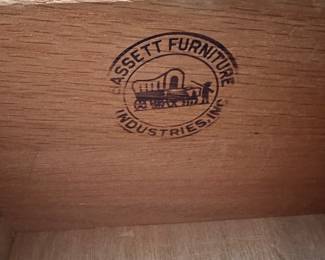 L16 - $125. Bassett Furniture Dresser with Mirror. Measures 52.5" wide x 17.75" deep x 31.75" tall. Mirror is 26" x 37". Mirror is NOT attached and is wall hanging. All drawers slide easily. Minor surface wear / marks.